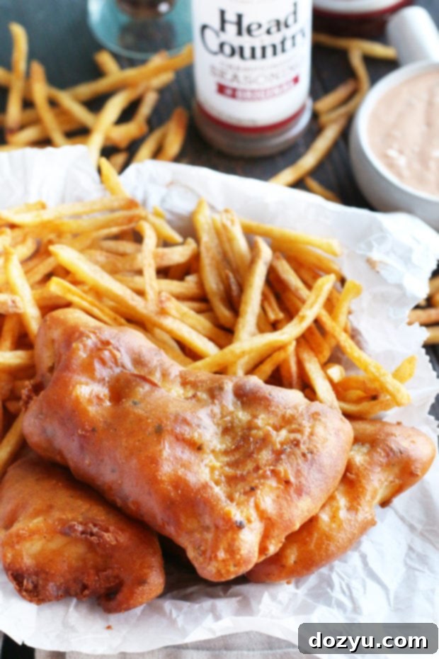 Crispy golden BBQ Beer Battered Fish and perfectly seasoned fries