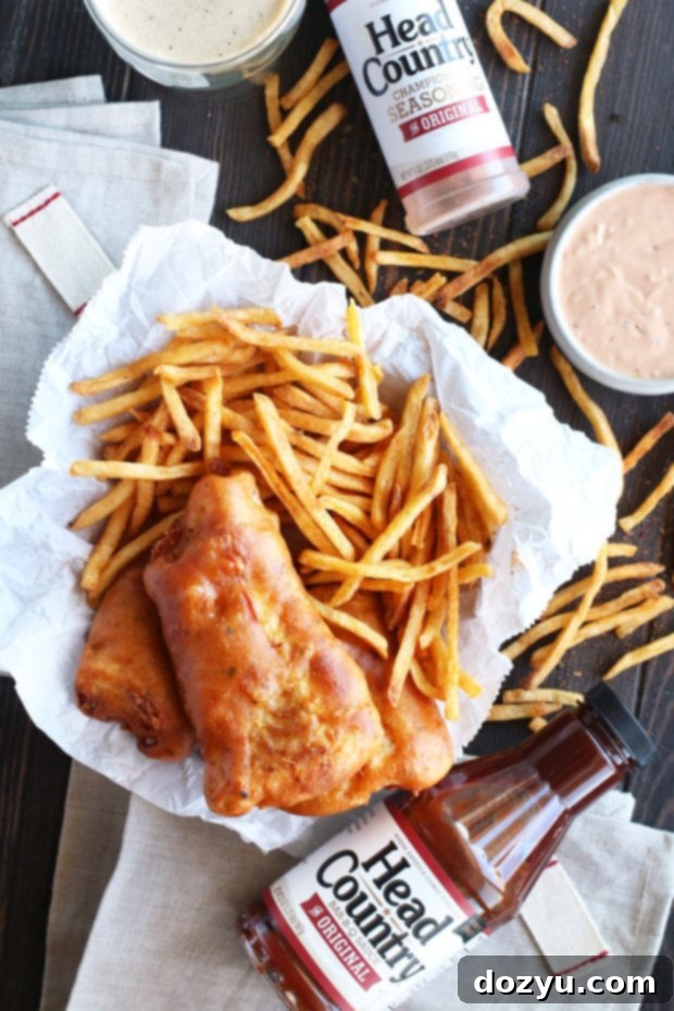 Close-up of golden brown BBQ Beer Battered Fish on a wire rack