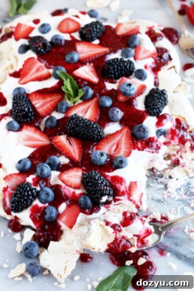 Crushed Berry Cloud Pavlova 5 Summer dessert with raspberry compote
