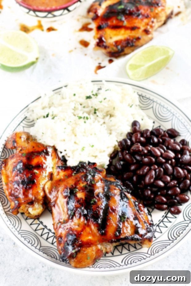 Serving of Tequila Lime Chicken Thighs with fresh lime and cilantro