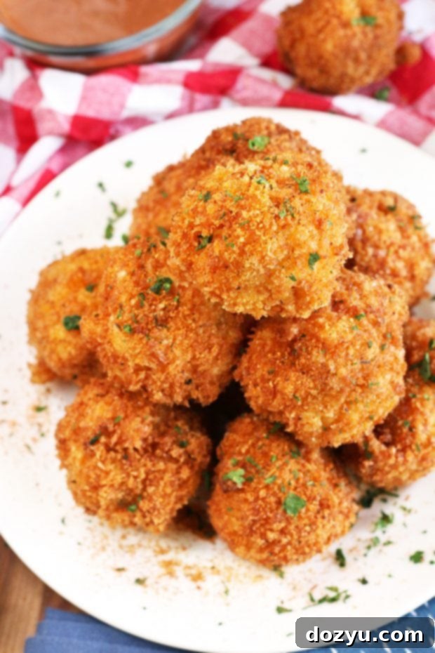 BBQ Fried Mac & Cheese Balls 8 Assorted Head Country BBQ products: seasoning and sauces, displayed next to a plate of mac and cheese balls.