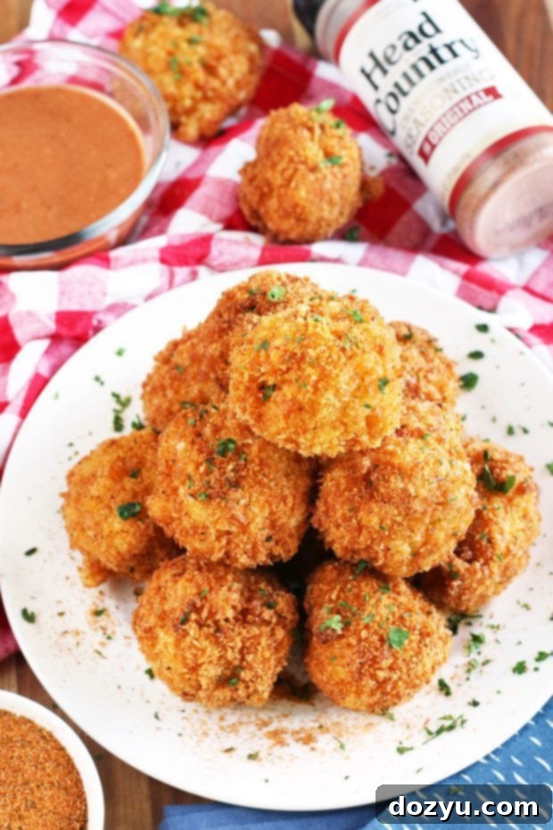 BBQ Fried Mac & Cheese Balls 7 A large platter of BBQ Fried Mac N Cheese Balls, ready for sharing.