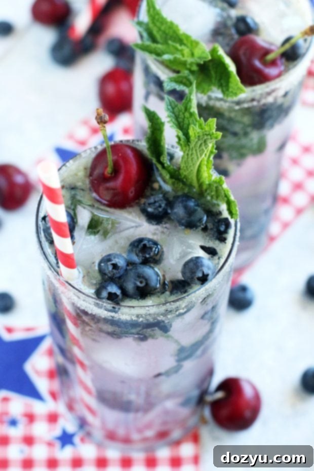 Another view of the Cherry Blueberry Mojito, highlighting its vibrant colors