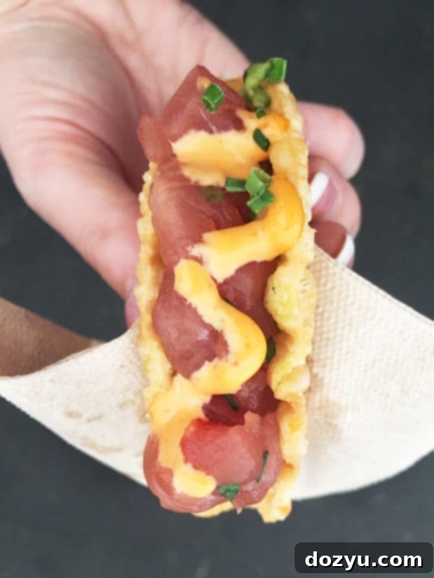 Assortment of delicious small bites including sliders and tacos at the Denver Food + Wine Grand Tasting.