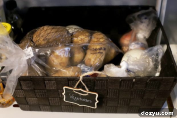 Simplify Your Kitchen: 5 Quick Organization Hacks 13 Close-up of a neatly organized drawer with utensils