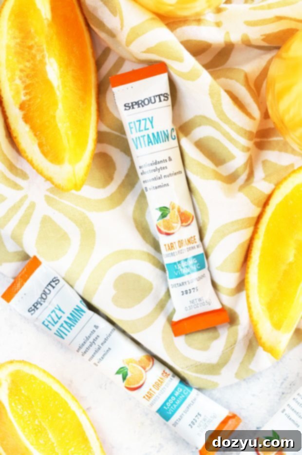 Exotic Mimosa Sparkler 5 Ingredients for a Tropical Mimosa Mocktail: Sprouts Vitamin C packets, orange, pineapple, and coconut juices.