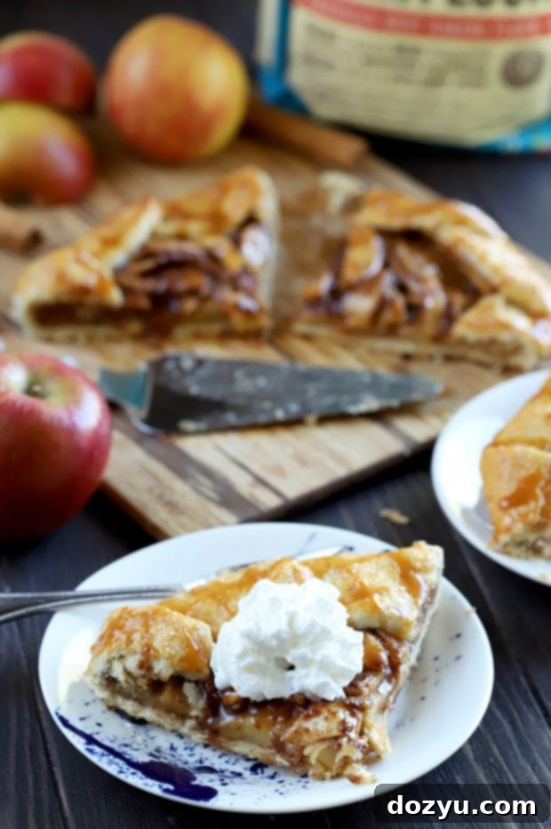 Bourbon-Kissed Caramel Apple Galette 6 Side view of Bourbon Caramel Apple Galette showcasing the flaky crust