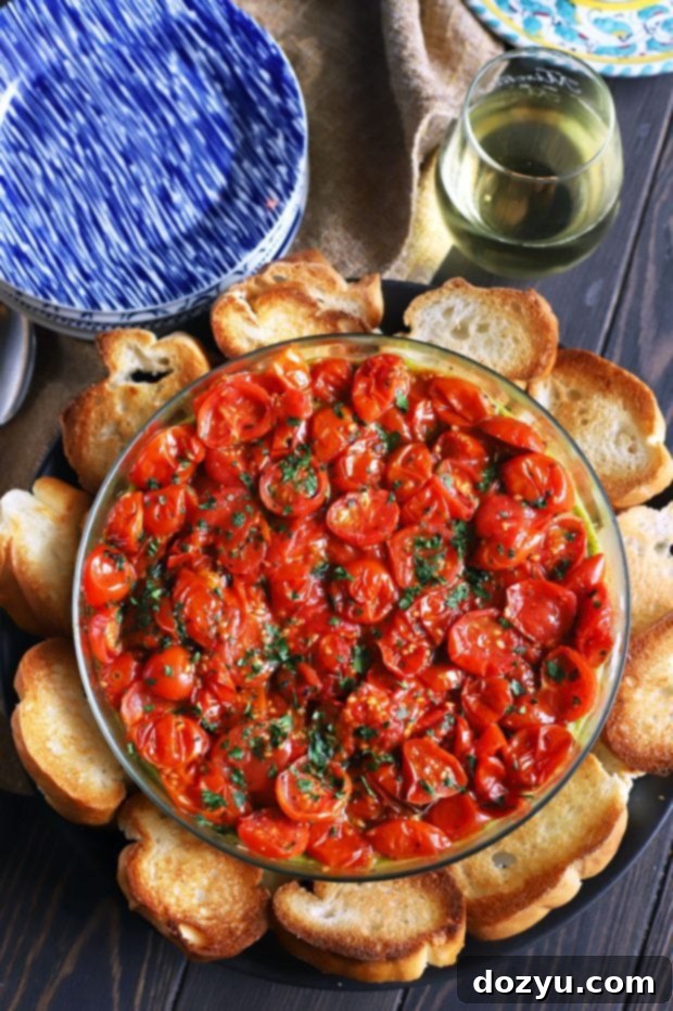 Close-up of the creamy Avocado Ricotta Tomato Pesto Layer Dip