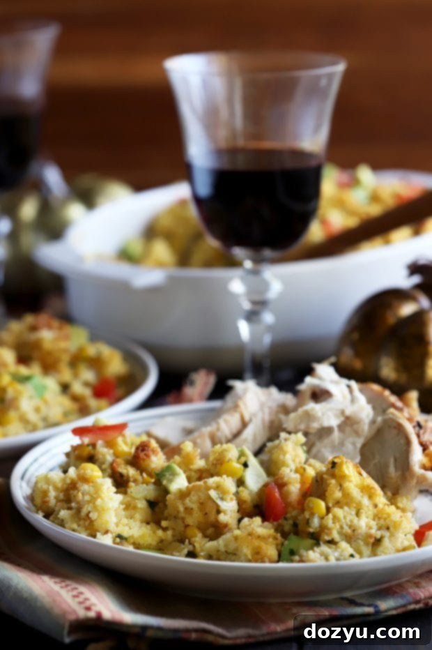 Plated Green Chile Cornbread Stuffing with a side of turkey and gravy