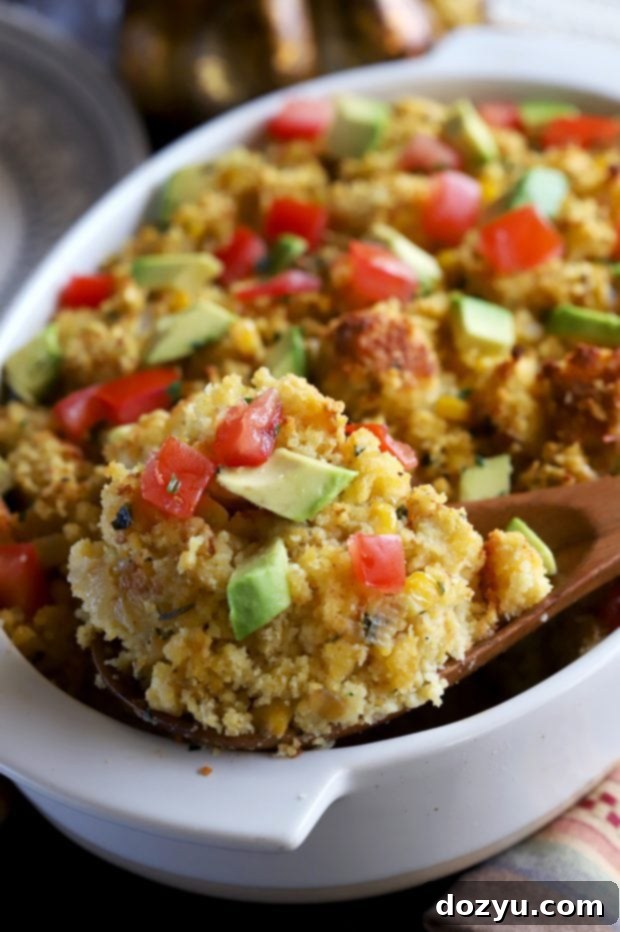 Close-up of Green Chile Cornbread Stuffing with fresh herbs
