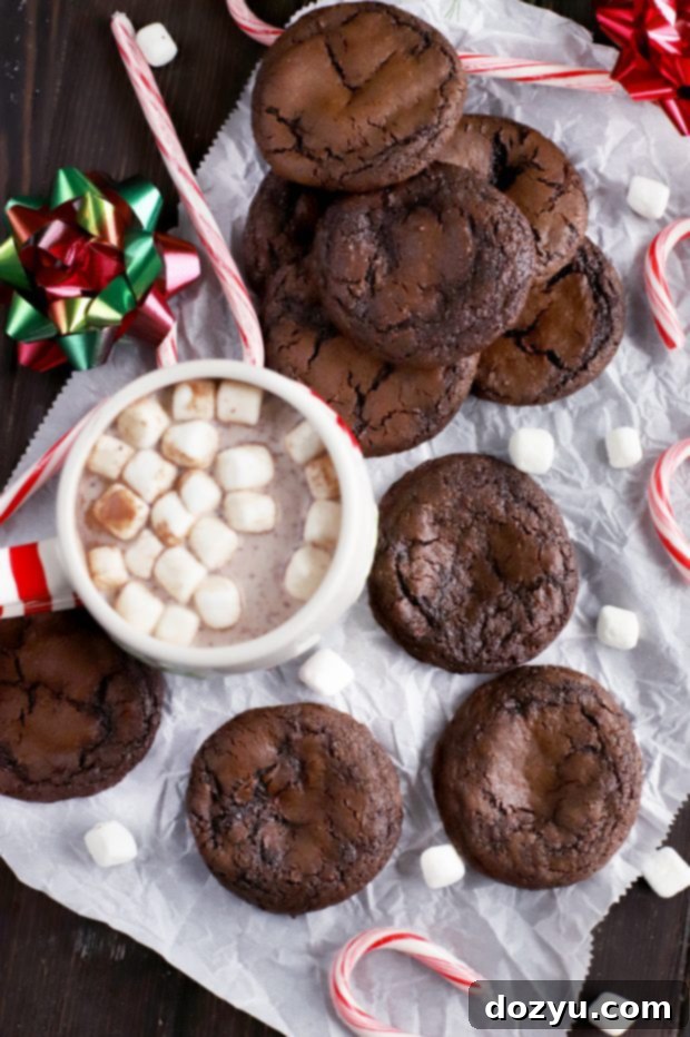 Cozy Peppermint Hot Cocoa Cookies 2 Gooey Peppermint Hot Chocolate Cookies with a marshmallow center