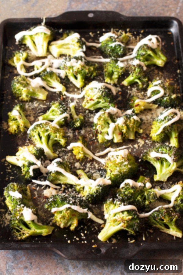 Thanksgiving SOS Recipes 13 Crispy Roasted Broccoli with Garlic Cream Sauce - Last Minute Thanksgiving Recipes | cakenknife.com