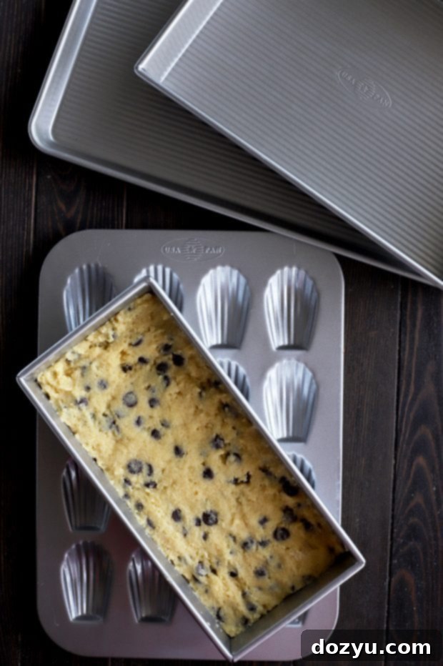 Biscotti logs baking in a non-stick USA Pan Biscotti pan