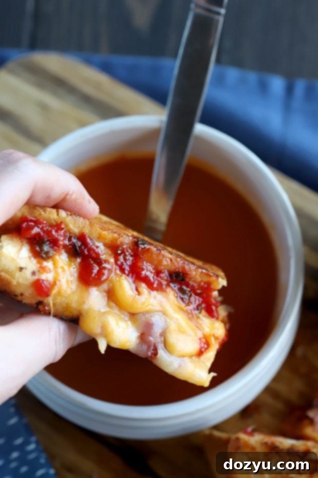 The ingenious inverted method: baguette halves are buttered on the cut sides and filled with cheese and jam