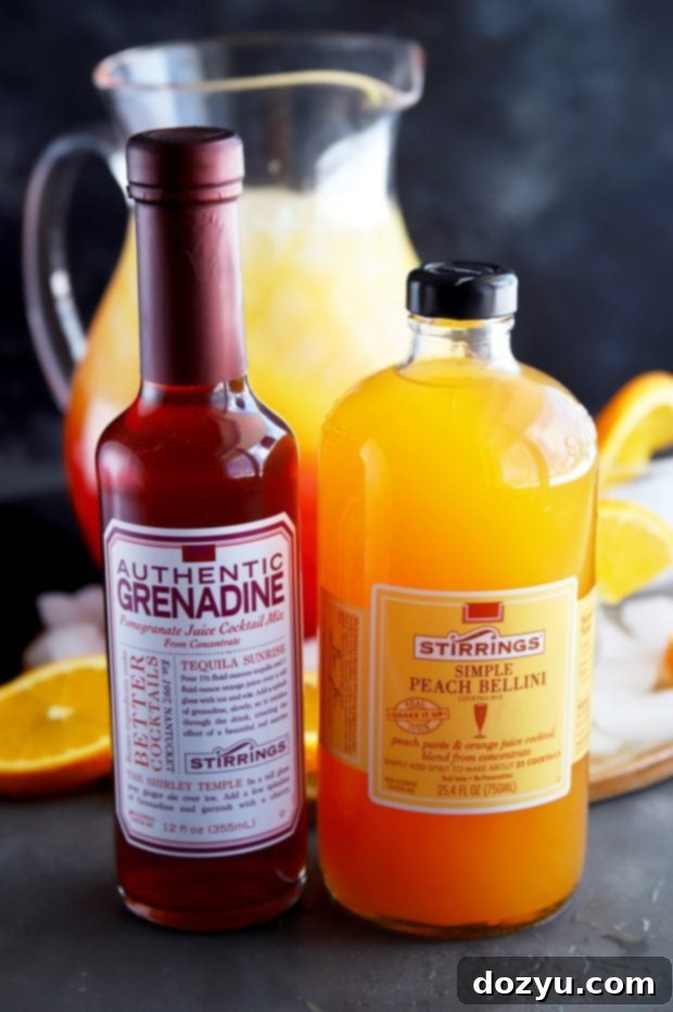 Ingredients for Peach Tequila Sunrise Punch, including Stirrings grenadine