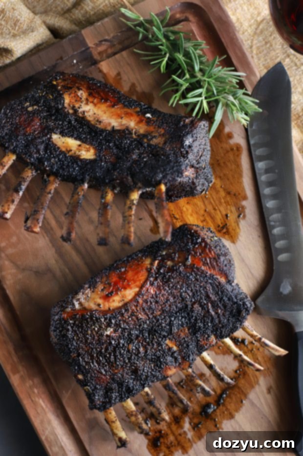 Chipotle Coffee Crusted Rack of Lamb with sauce on spoon