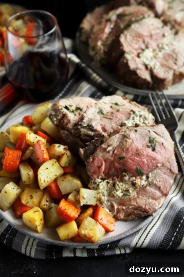 Roasted Leg of Lamb with Herbed Goat Cheese Stuffing 8 Stuffed sliced leg of lamb with vegetables