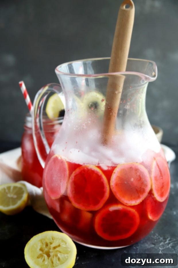 Blackberry vodka lemonade in a pitcher