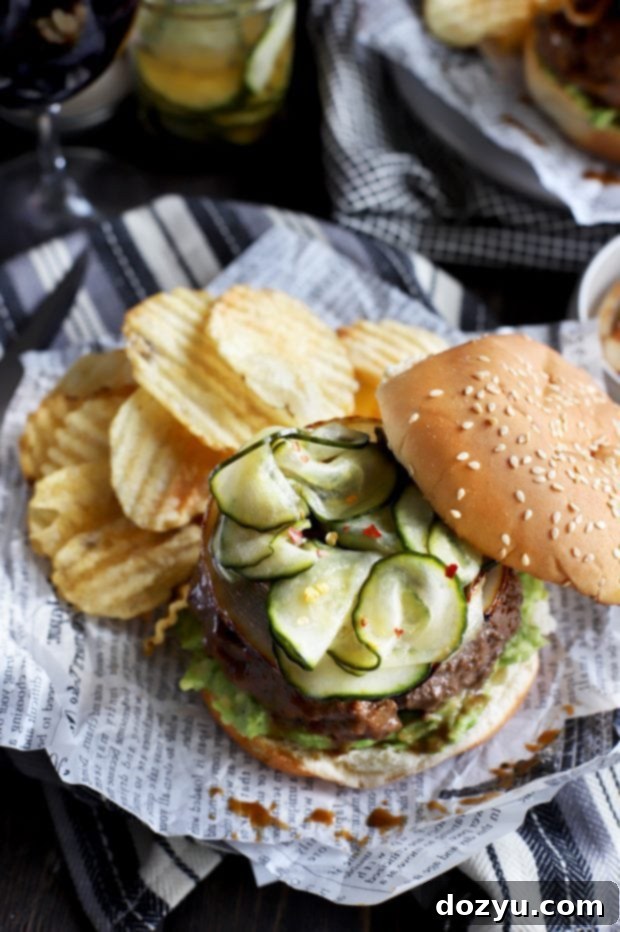 Spicy Miso Umami Burgers with Crisp Asian Pickles 8 Image of an Asian-inspired burger, showcasing the patty and bun.