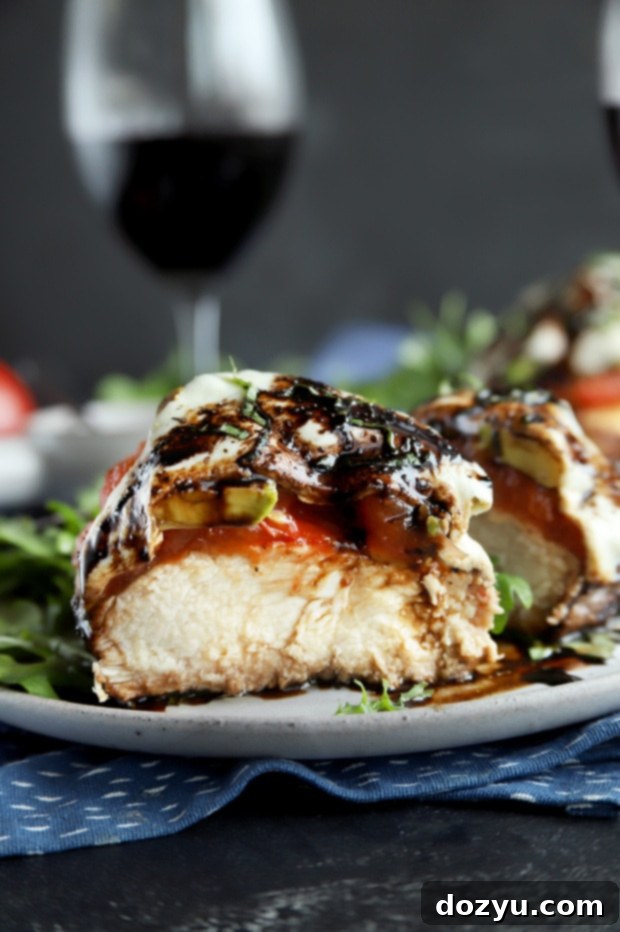 Grilled Caprese Chicken with Avocado Bliss 9 Avocado caprese chicken cut in half for dinner