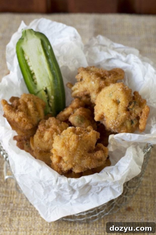 Zesty Jalapeño Mac & Cheese Fritters 2 Golden crispy fried jalapeño mac and cheese bites