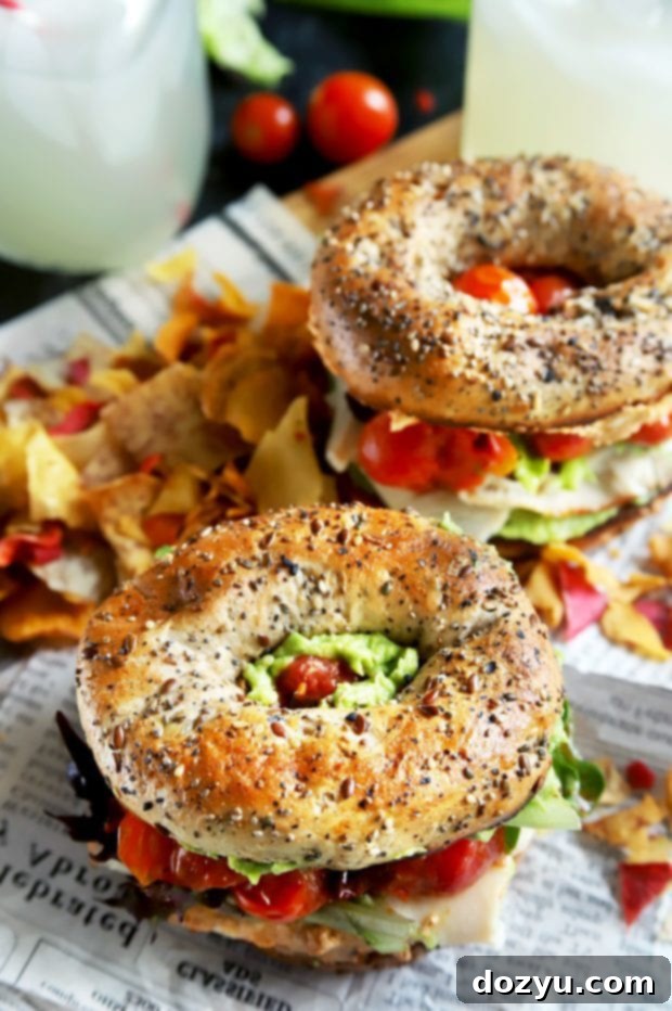 Everything Avocado Turkey Bagel Sandwich 4 Bagel sandwiches with chips and veggies