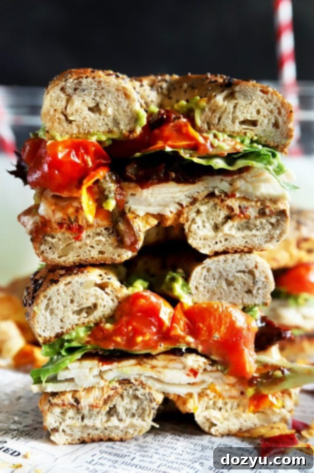 Everything Avocado Turkey Bagel Sandwich 5 Stacked up halves of a sandwich