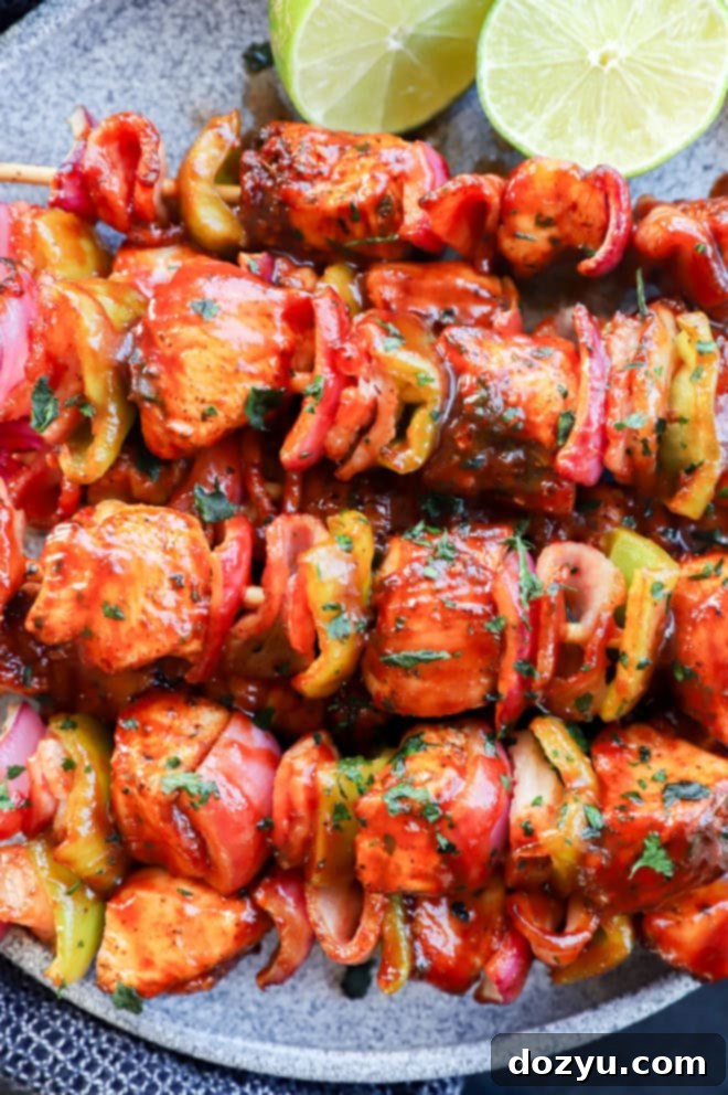 Smoky Chipotle Grilled Chicken Skewers 3 Skewers of chicken, bacon, onion, and bell pepper with bbq sauce