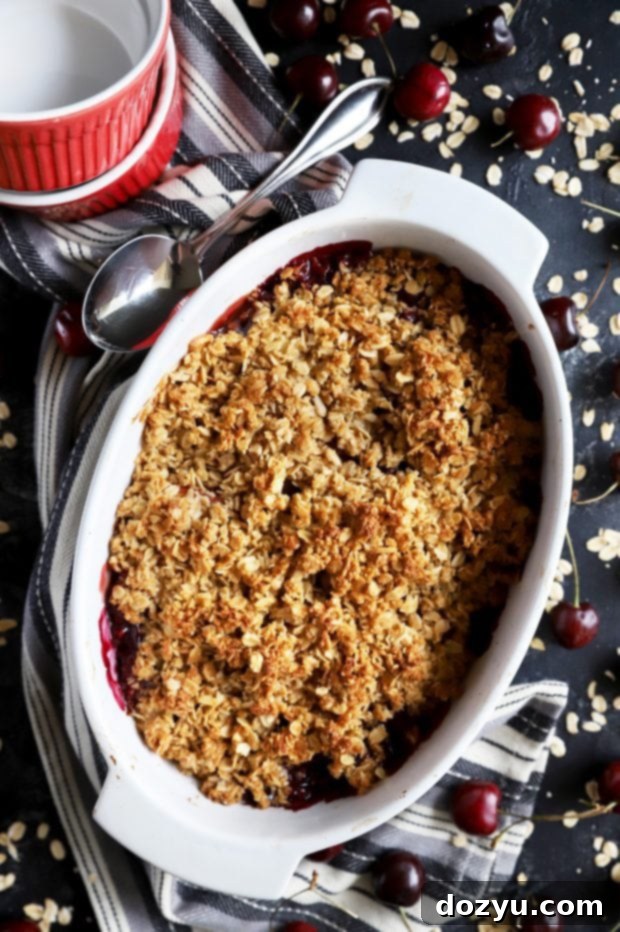 Sweet & Boozy Bourbon Cherry Peach Crumble 7 Crumble dessert in a baking dish
