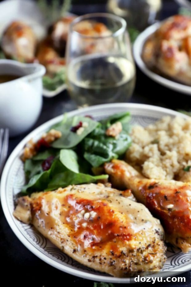 Aromatic White Wine and Herb Roasted Chicken 5 Chicken dinner on a plate with salad