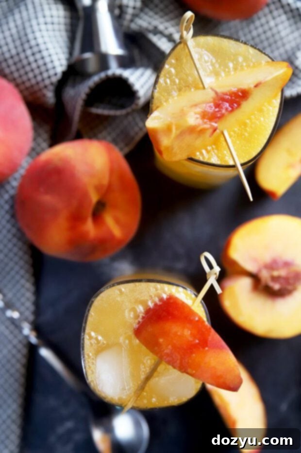Peaches in cocktails with whiskey and ginger