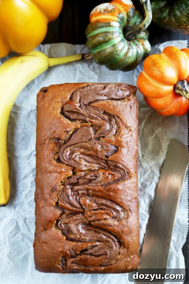 Decadent Pumpkin Banana Bread with Nutella Swirl 3 Full loaf of banana bread with pumpkin and nutella