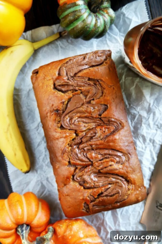 Decadent Pumpkin Banana Bread with Nutella Swirl 5 Baked banana bread with pumpkin and Nutella