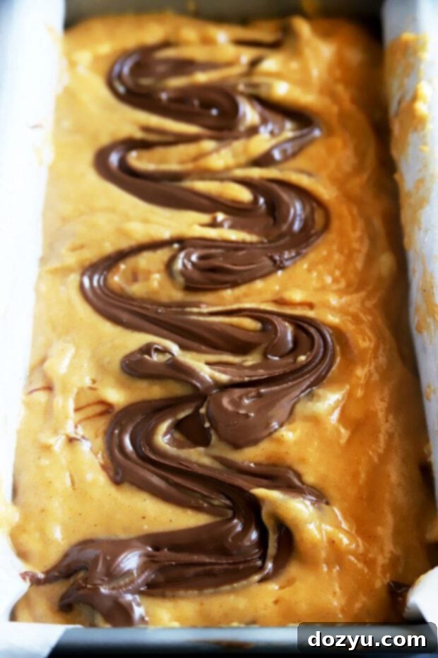 Decadent Pumpkin Banana Bread with Nutella Swirl 7 Bread batter with Nutella swirl