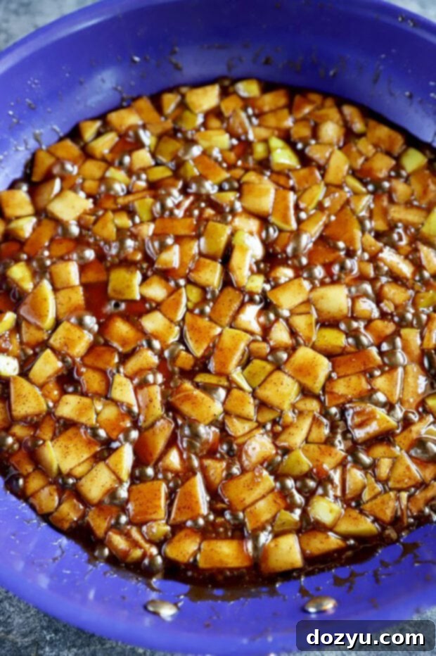 Golden Caramel Apple Bliss 6 Sauteeing apples with spices and butter in a nonstick skillet