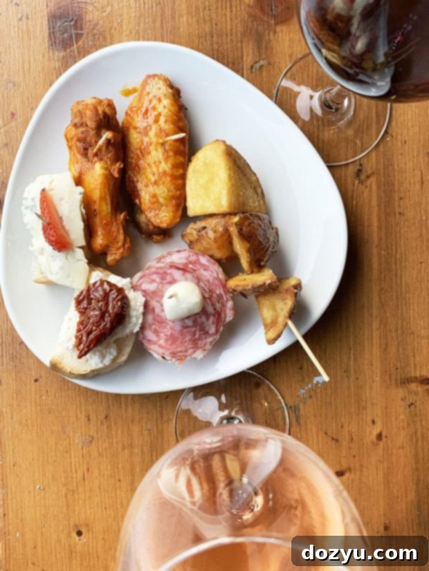 A street scene in Milan during aperitivo hour with people enjoying drinks and snacks