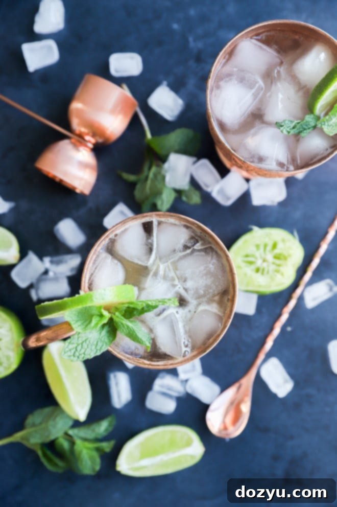 Kentucky Mule 2 Bourbon Mule in gleaming copper mugs, garnished with lime