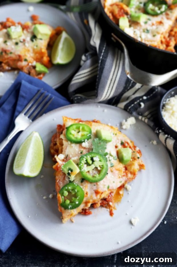 Another view of a slice of Short Rib Mexican Skillet Pie on a plate, ready to be enjoyed.