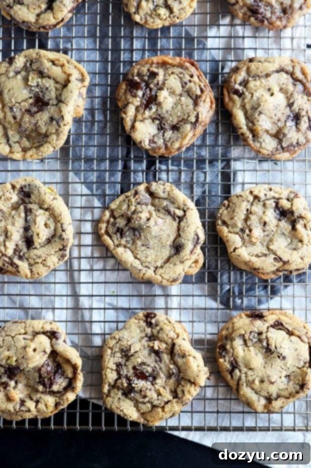 Irresistible Sea Salt Pistachio Dark Chocolate Cookies 3 Overhead shot of freshly baked Sea Salt Pistachio Dark Chocolate Cookies cooling on a rack