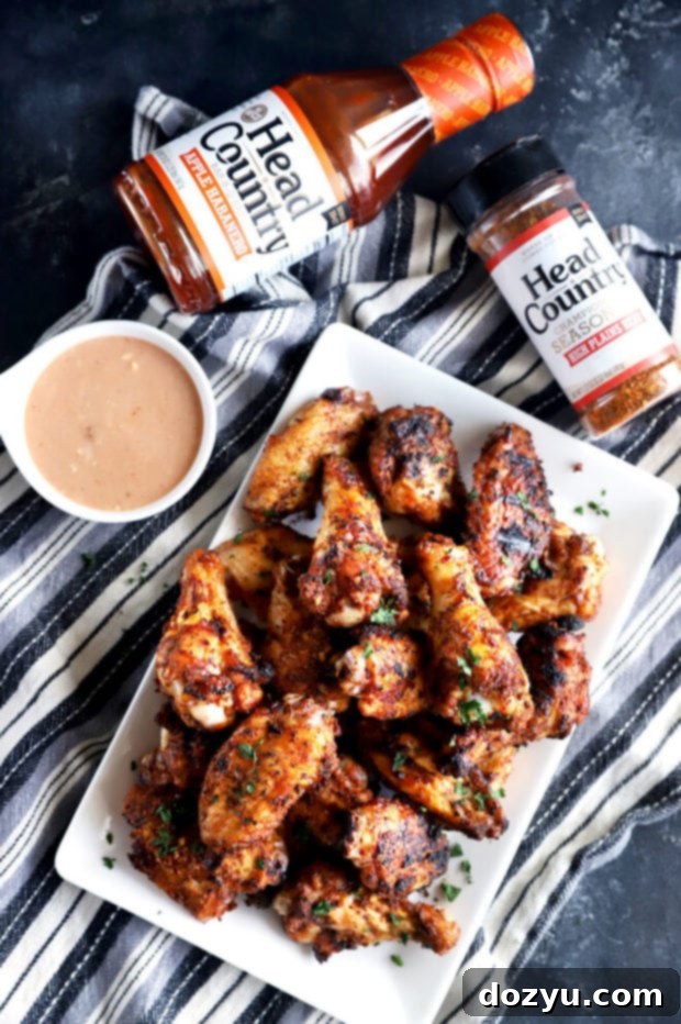 Smoky Dry-Rubbed Wings with Zesty BBQ Blue Cheese 2 Overhead photo of perfectly grilled dry rub chicken wings on a platter