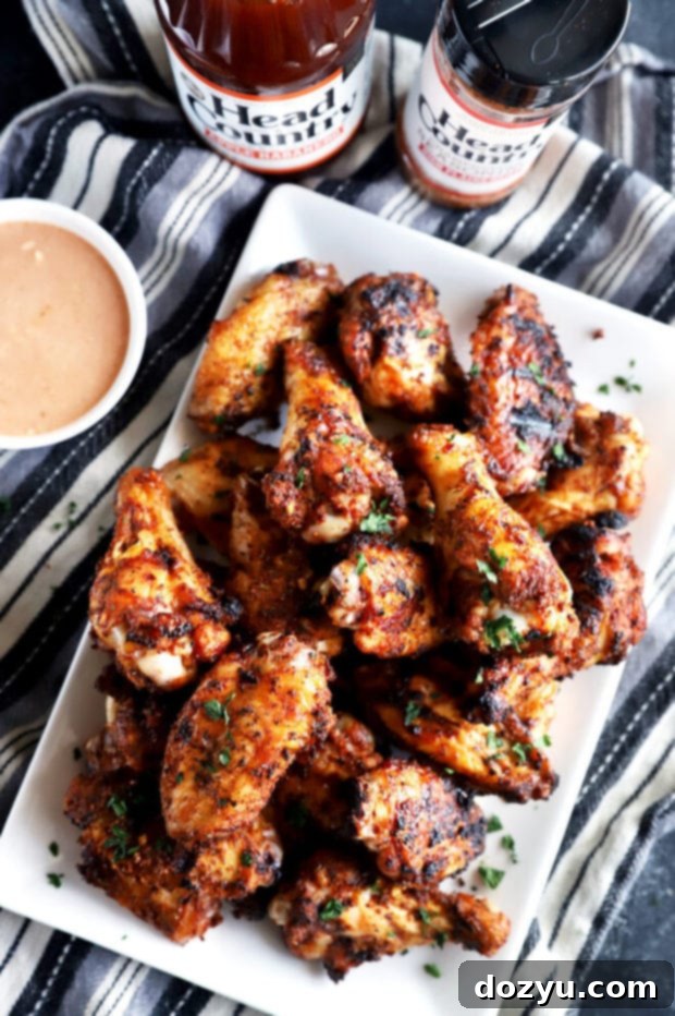 Smoky Dry-Rubbed Wings with Zesty BBQ Blue Cheese 6 Overhead photo of a generous platter of dry rub chicken wings ready to serve