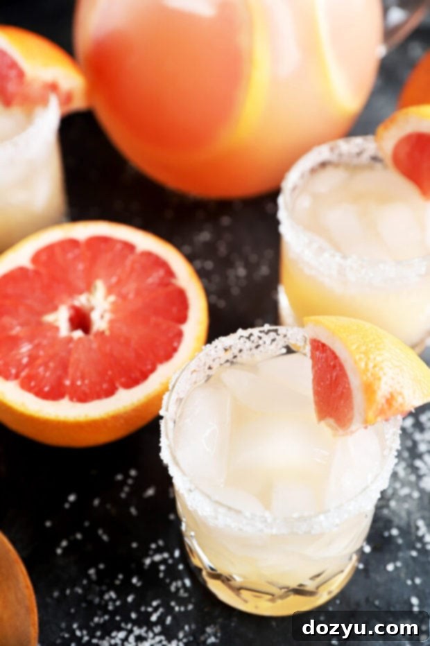 Overhead photo of grapefruit cocktail in glasses