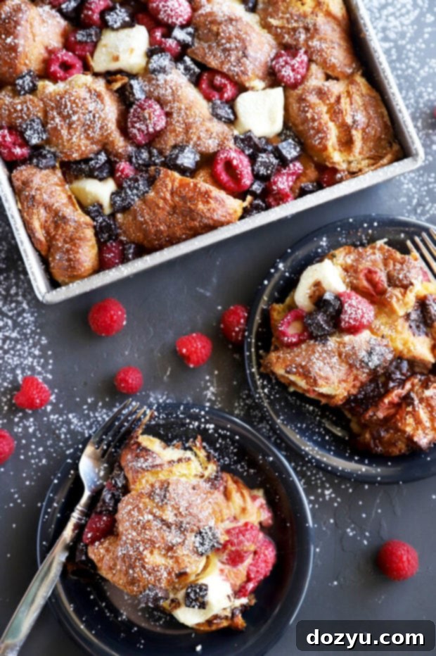 Decadent Raspberry Chocolate Croissant French Toast Casserole 4 Overhead photo of French toast bake on plates