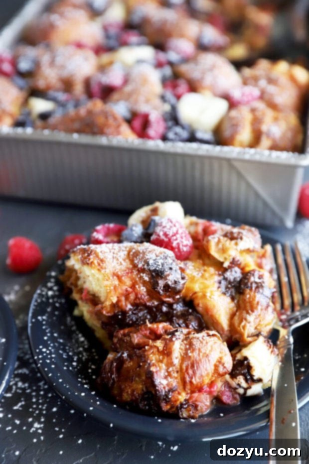 Decadent Raspberry Chocolate Croissant French Toast Casserole 7 Croissant French toast bake photograph