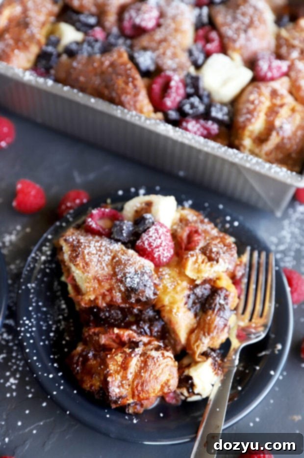 Decadent Raspberry Chocolate Croissant French Toast Casserole 9 Slice of French toast casserole photo