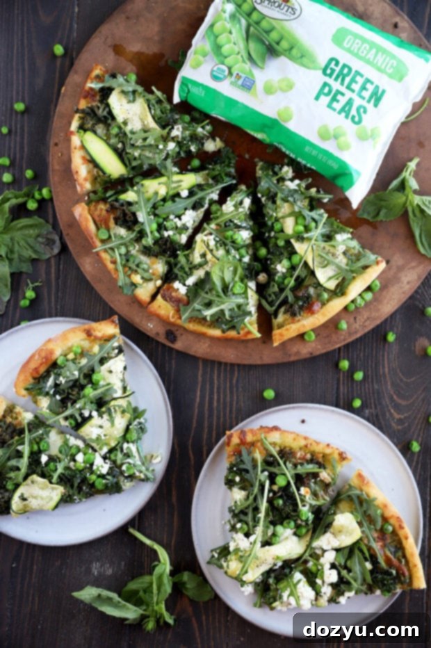 Garden Pesto Pizza 4 Overhead photo of slices of pizza on plates