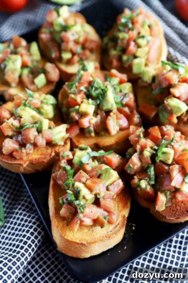 Avocado Garlic Bites 9 Photo of avocado bruschetta on a platter