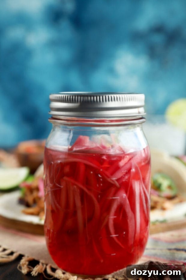 Speedy Instant Pot Chipotle Chicken Tacos 5 Jar of vibrant quick pickled red onions, a key taco topping