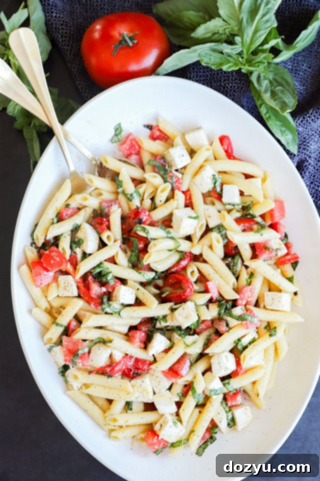 Sunshine Lemon Pasta Salad 8 spoons in serving bowl for penne and vegetable side dish