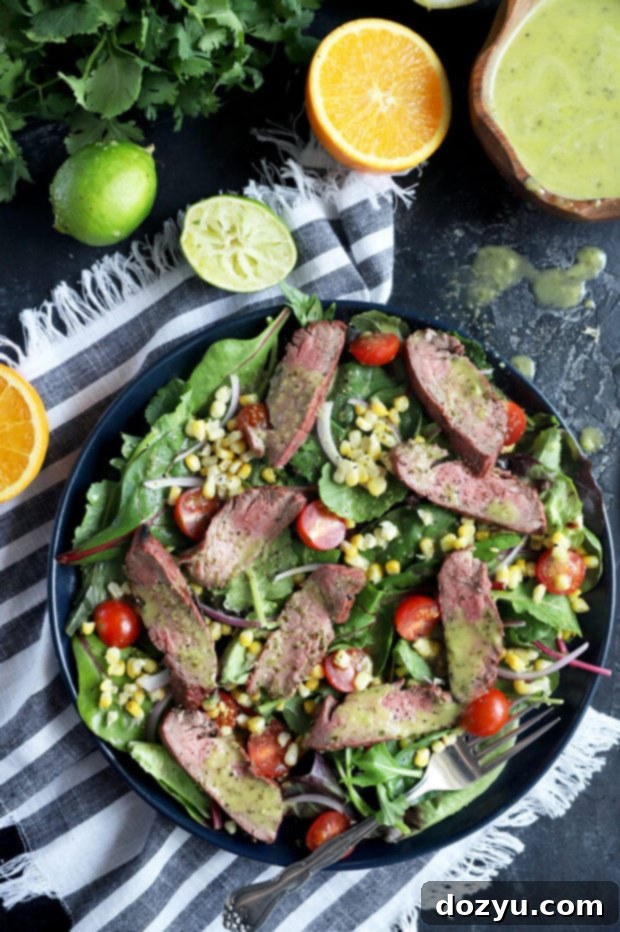 Photo of steak salad with corn and tomatoes, a close-up of the delicious dish